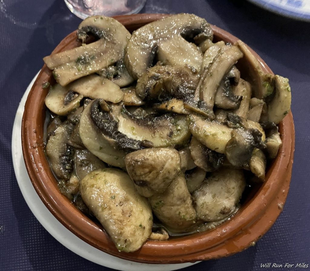 a bowl of mushrooms on a plate