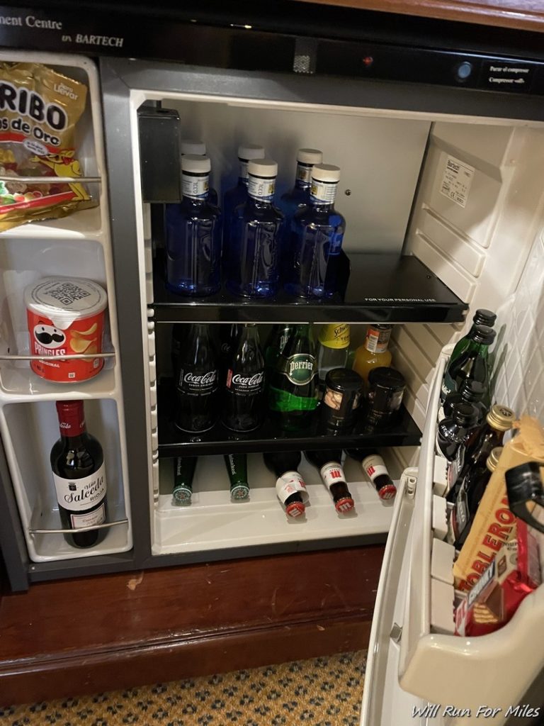 a mini fridge full of drinks and beverages