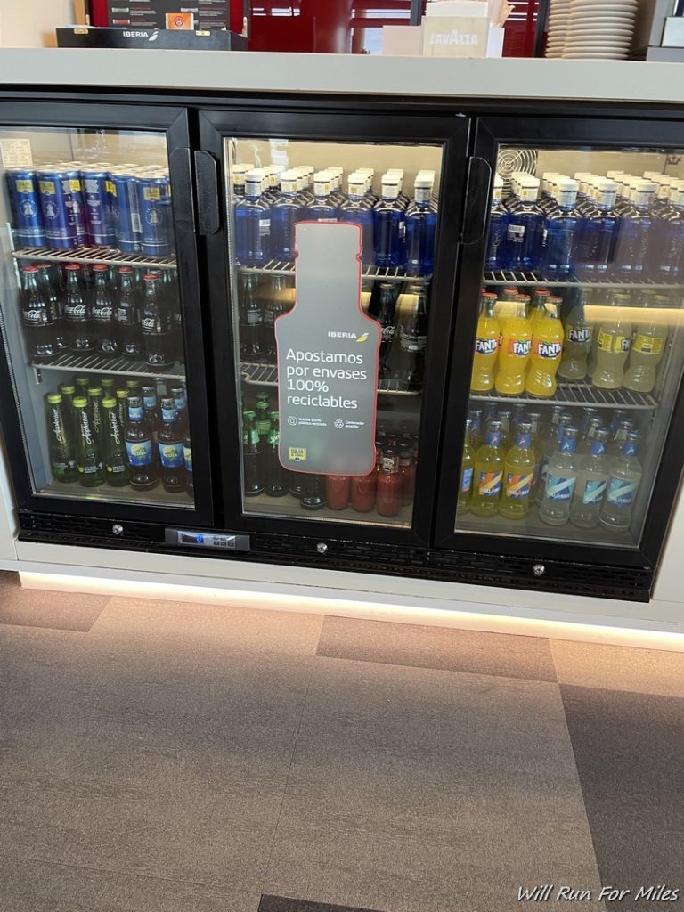 a refrigerator with drinks in it