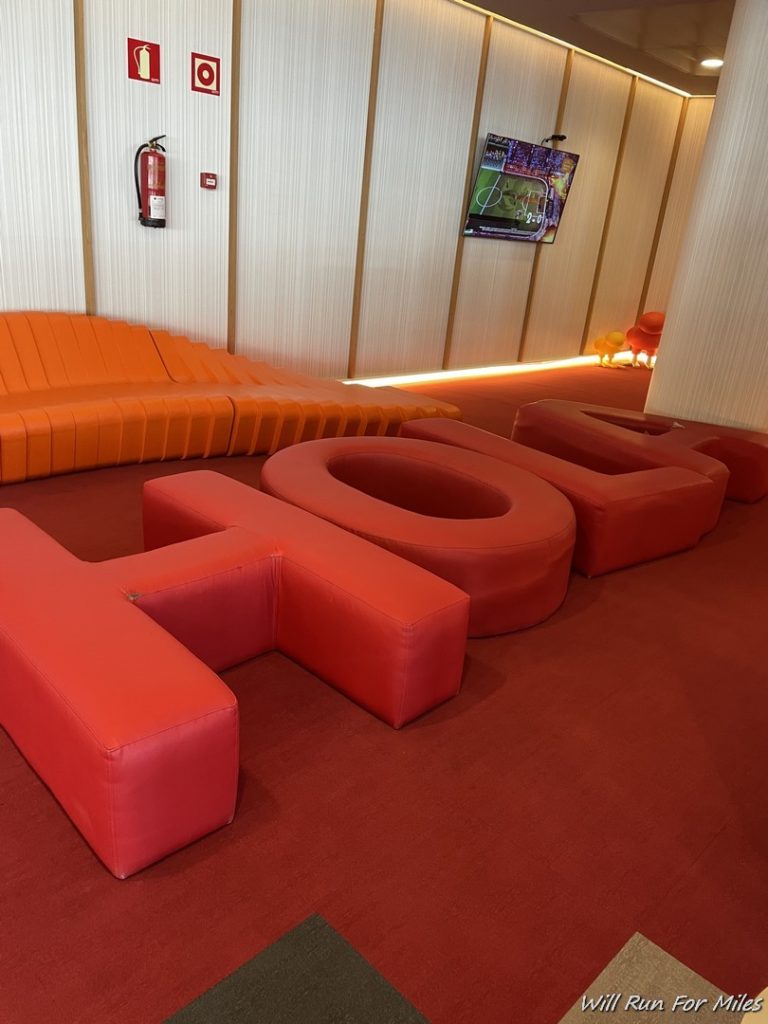 a red and orange couches in a room