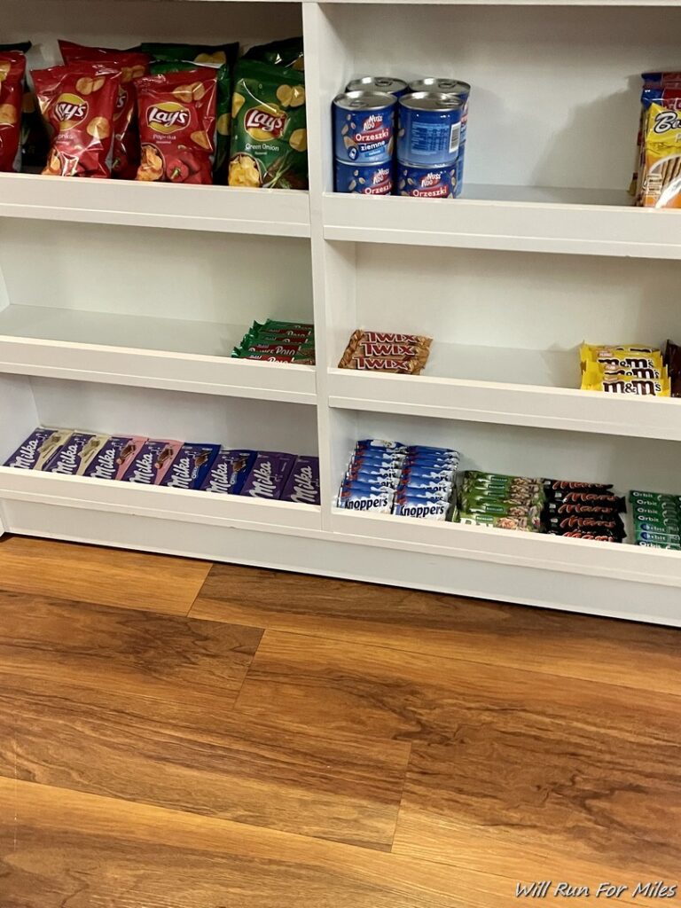 shelves with candy and snacks on it