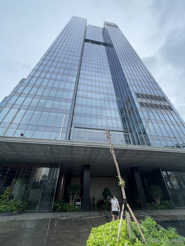 a tall building with a tall glass tower