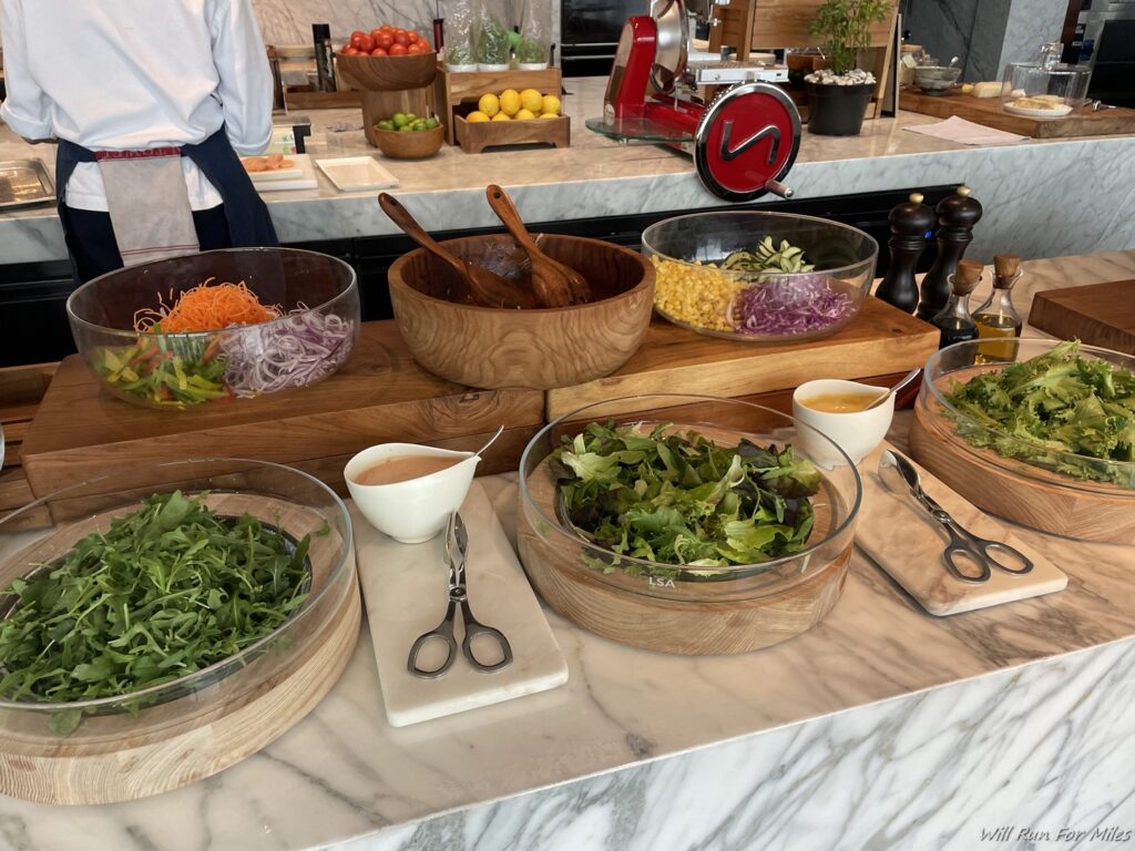 a counter with bowls of food