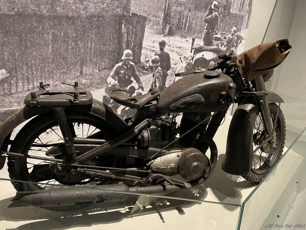 a motorcycle on display in a museum