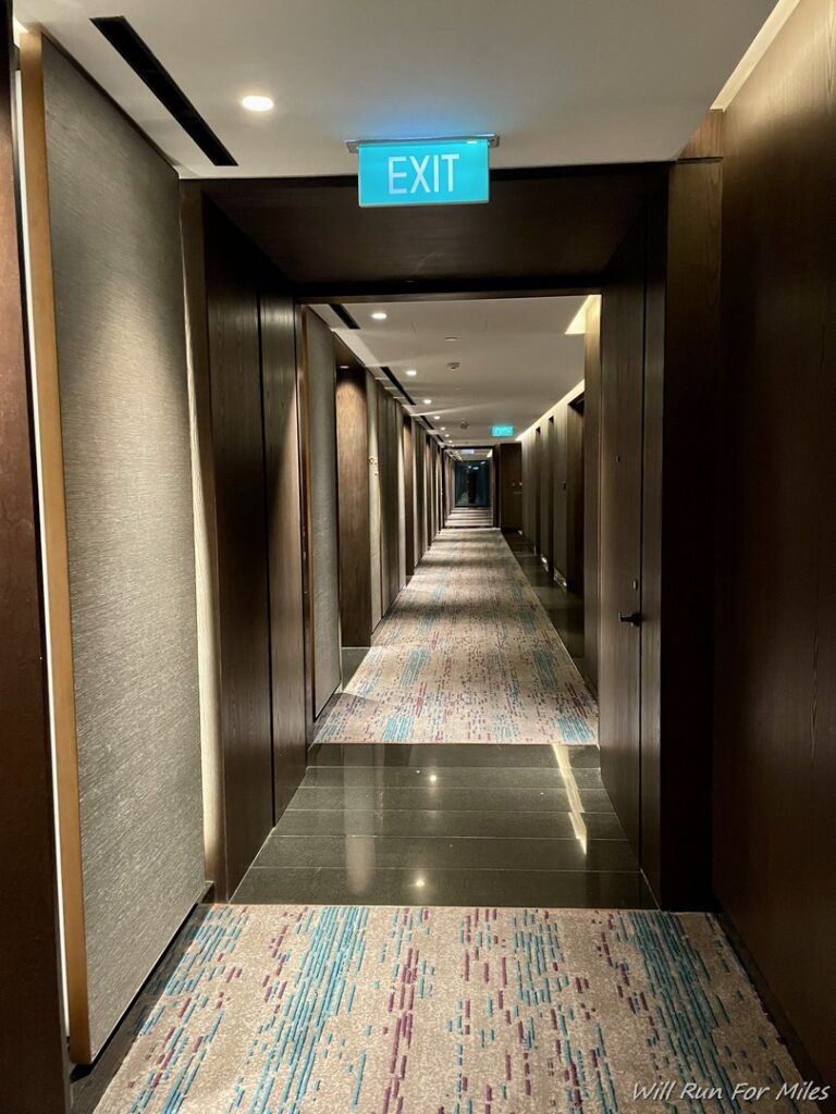 a hallway with a sign