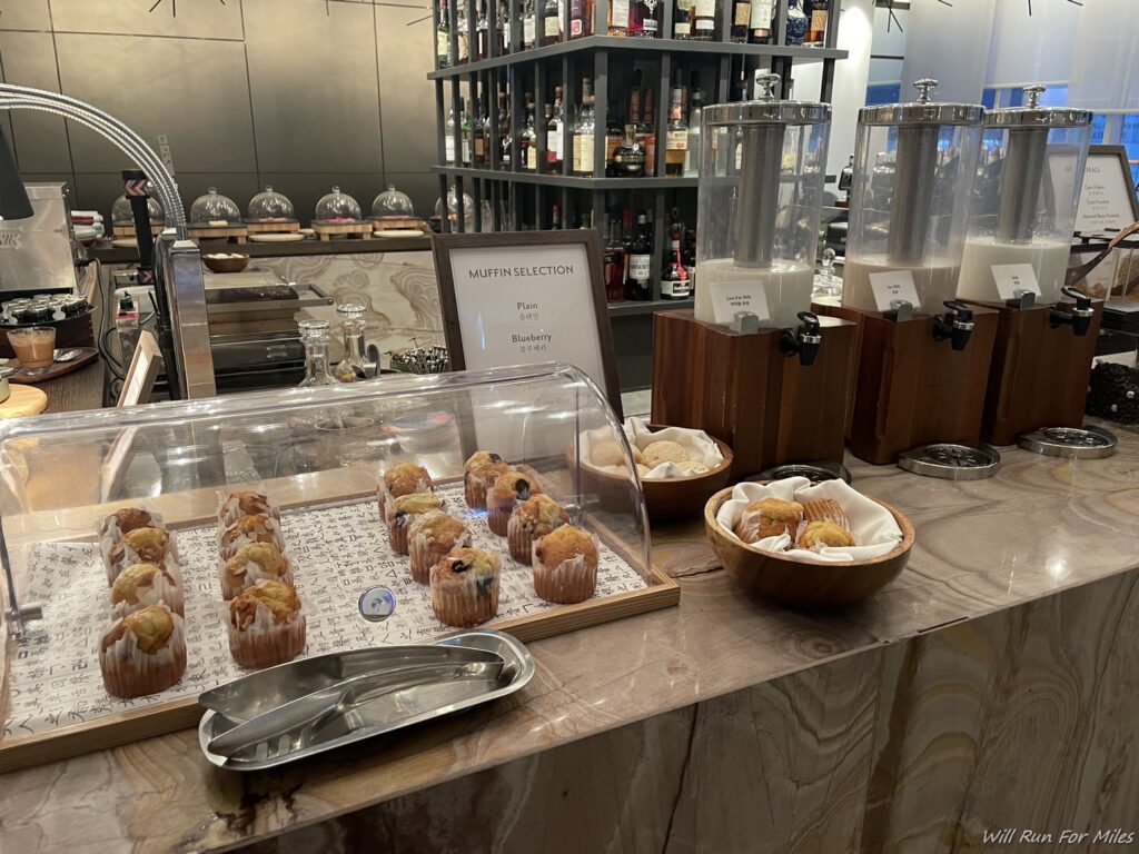 a counter with muffins on it