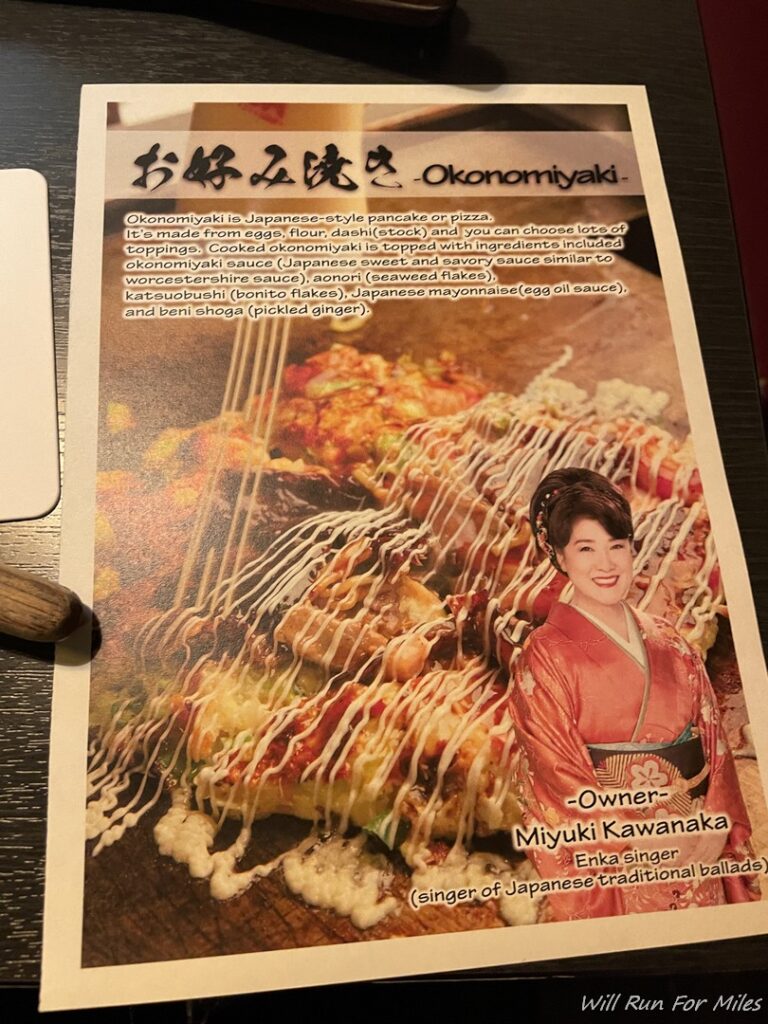 a menu with a woman on it