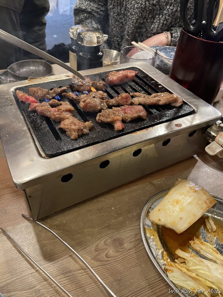 a grill with meat on it