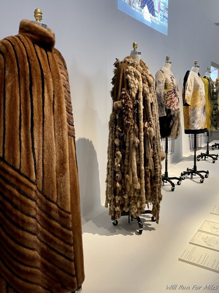 a group of mannequins with fur coats
