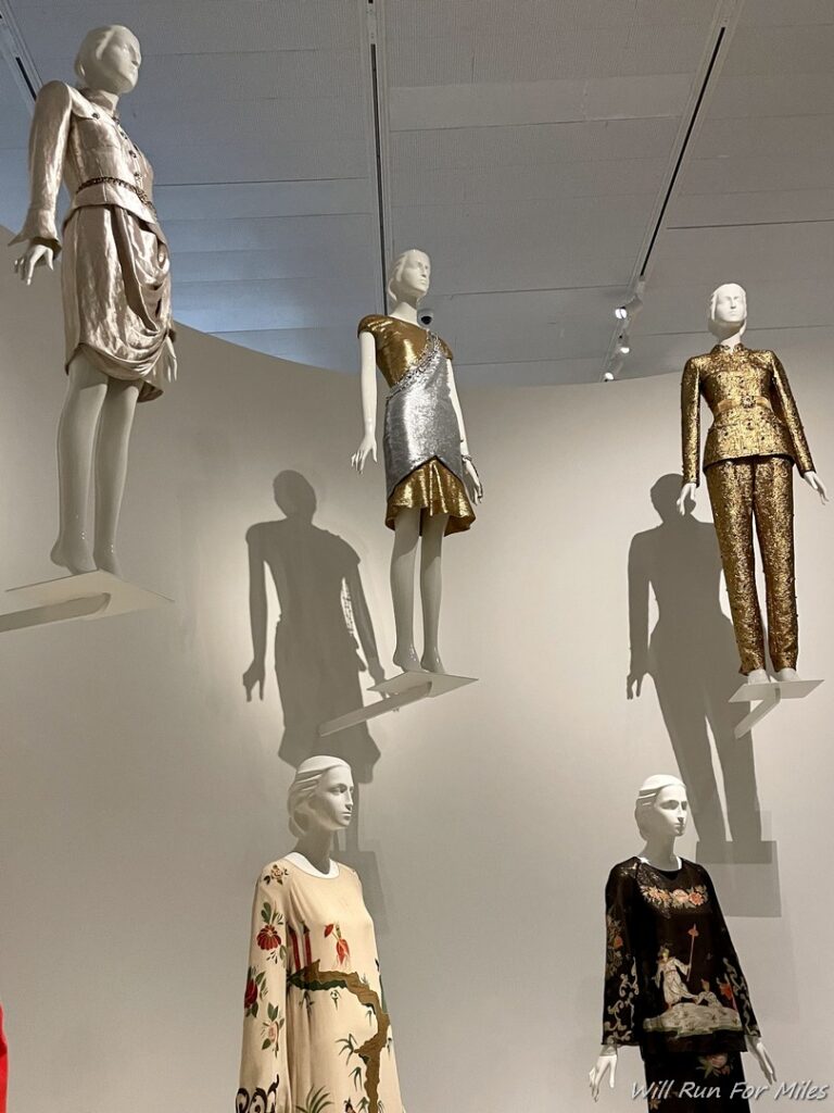 mannequins in a room with a white wall and a white ceiling and a white ceiling and a white ceiling and a white ceiling and a white ceiling and a white ceiling and a white wall