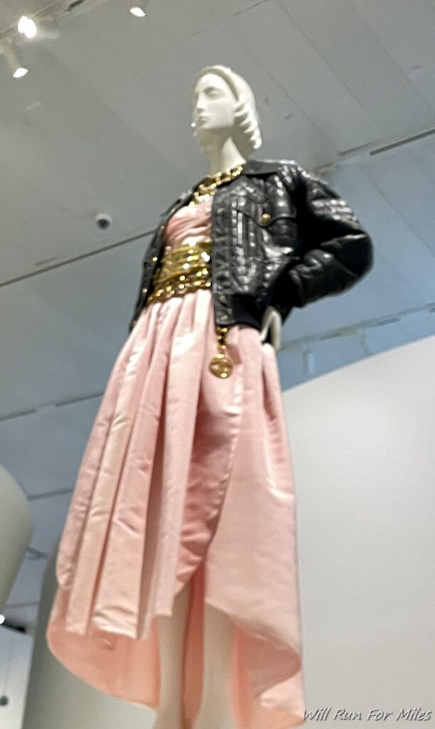 a mannequin wearing a dress and a jacket
