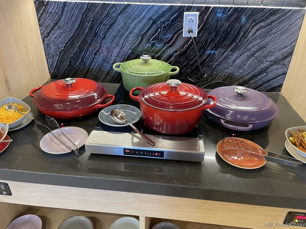 a group of pots on a stove