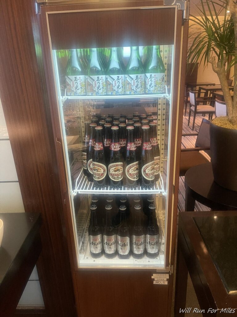 a display case with bottles of beer