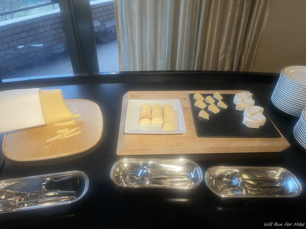 a table with different types of cheese on it