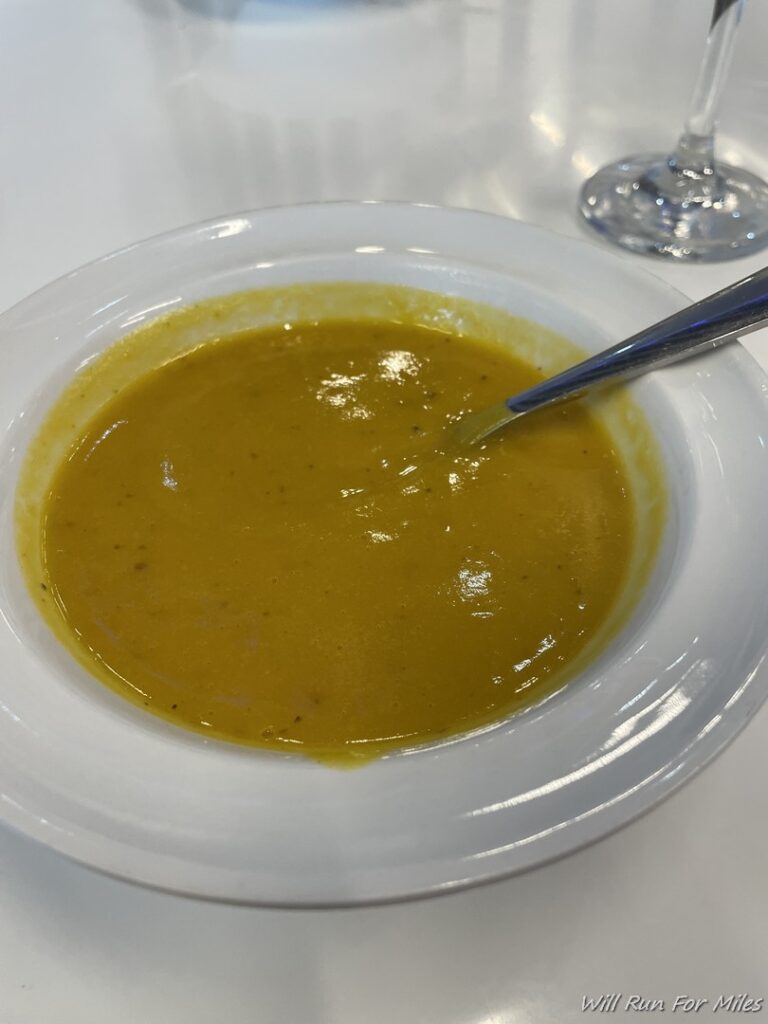 a bowl of soup with a spoon