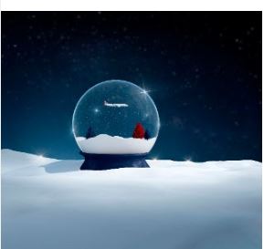 a snow globe with a plane in it