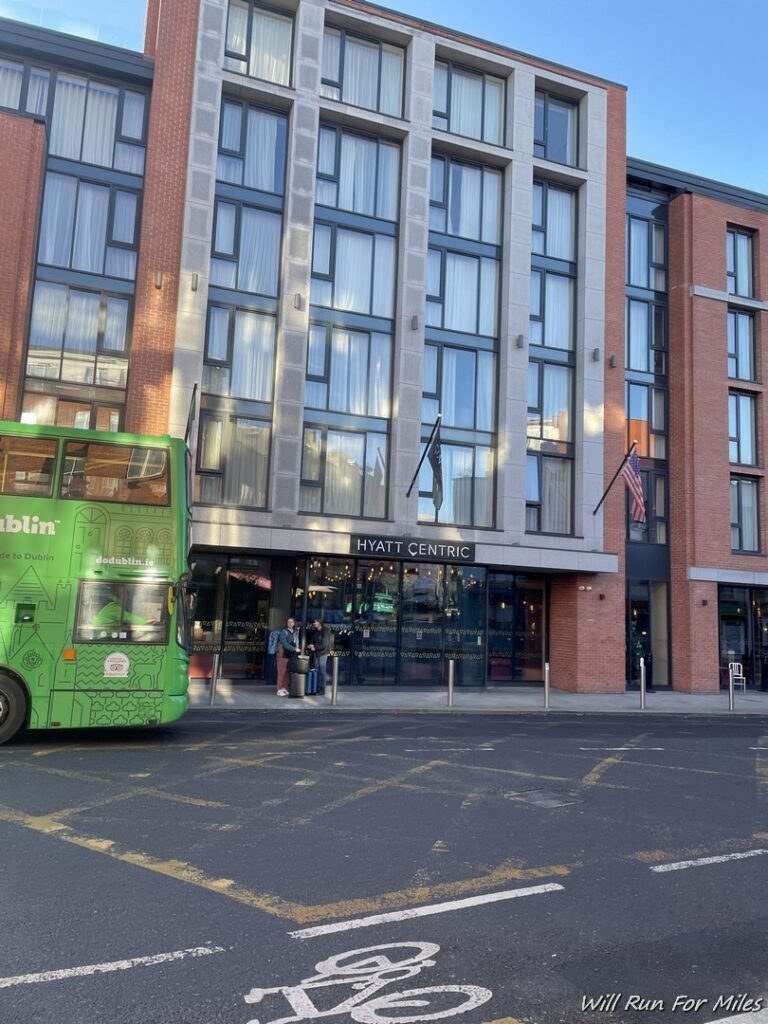 a double decker bus in front of a building