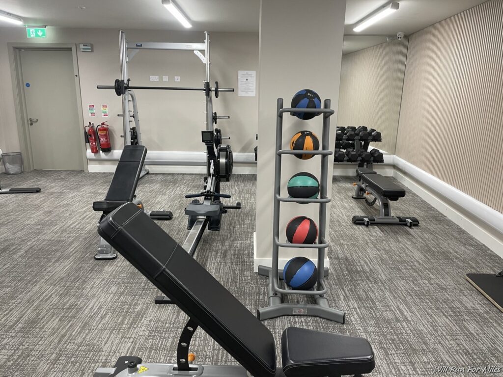 a gym with weights and exercise equipment