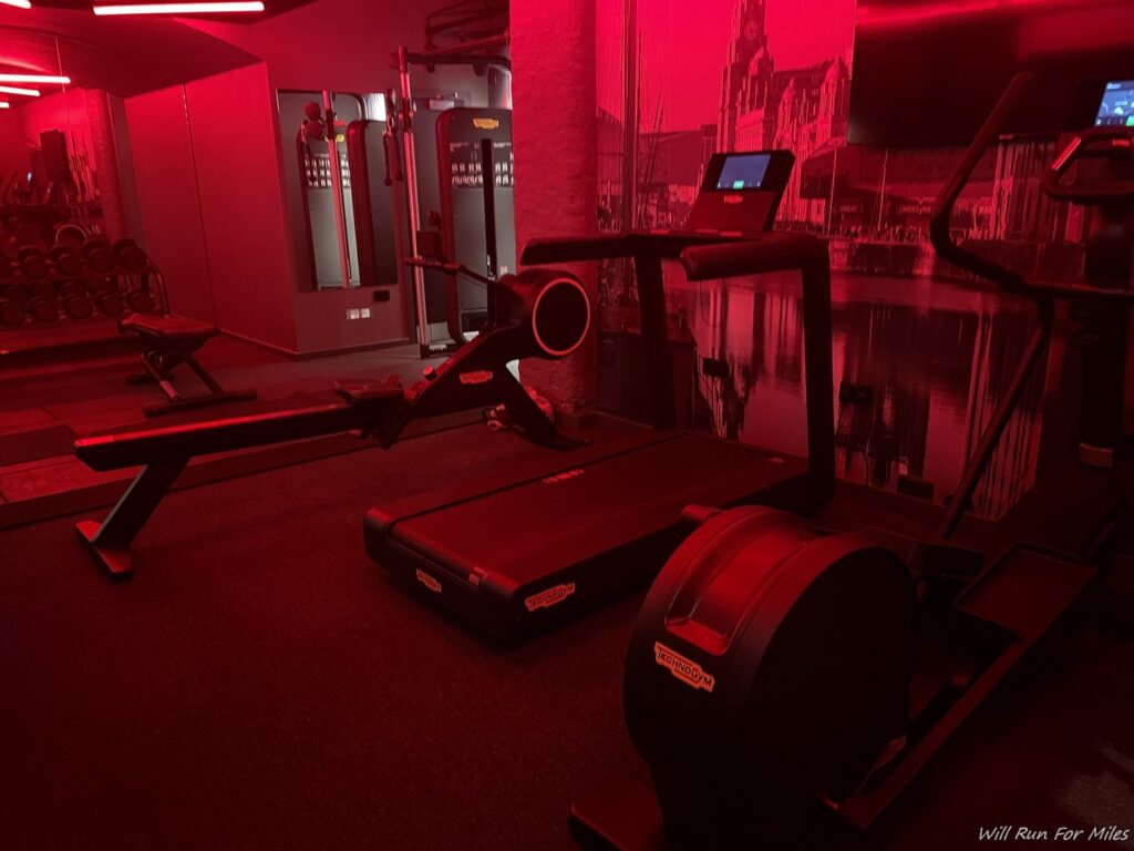 a gym with treadmills and exercise equipment