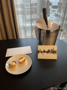 a plate of food and a card on a table