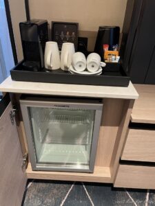 a coffee machine and coffee cups on a counter top
