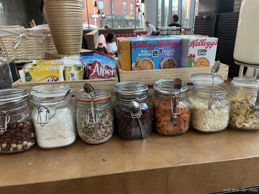 a group of glass jars with lids on a table