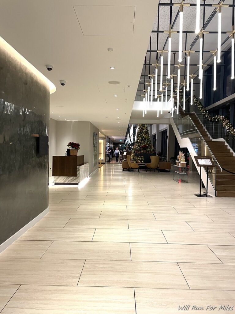 a hallway with lights from the ceiling