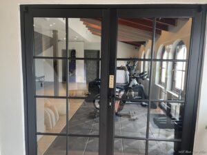 a gym with exercise equipment in the background