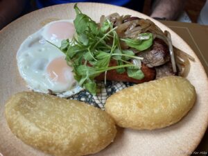 a plate of food with eggs and meat