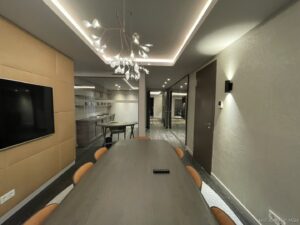 a room with a table and chairs