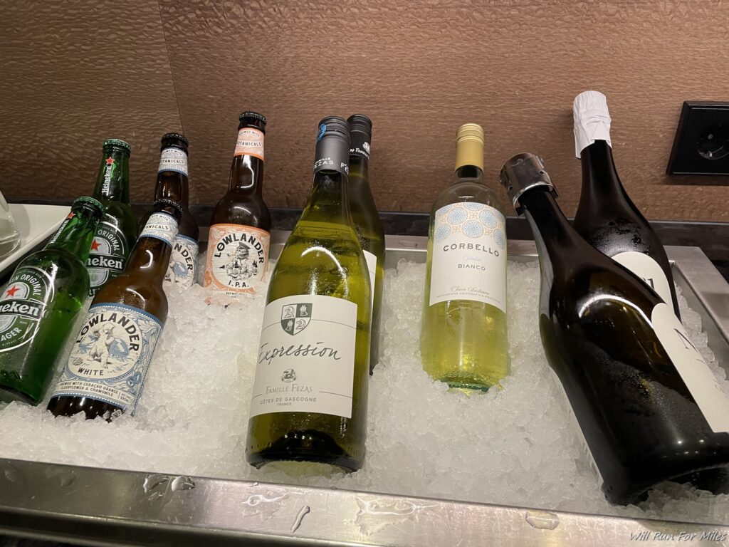 a group of bottles on ice