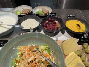 a table with bowls of food