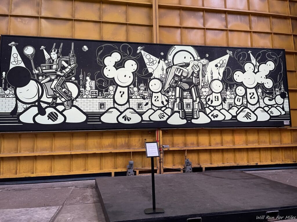 a large black and white art on a stage