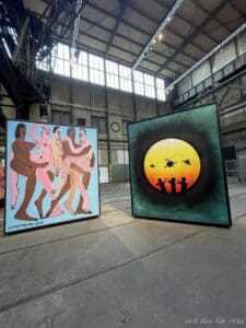a group of paintings in a building