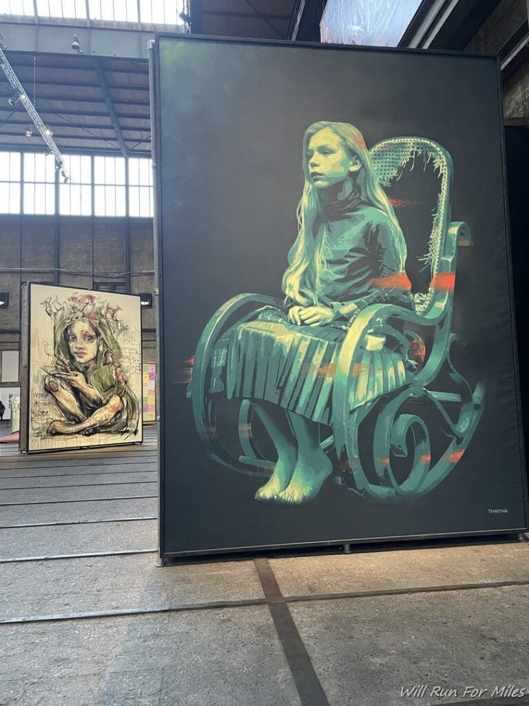 a painting of a girl sitting in a rocking chair