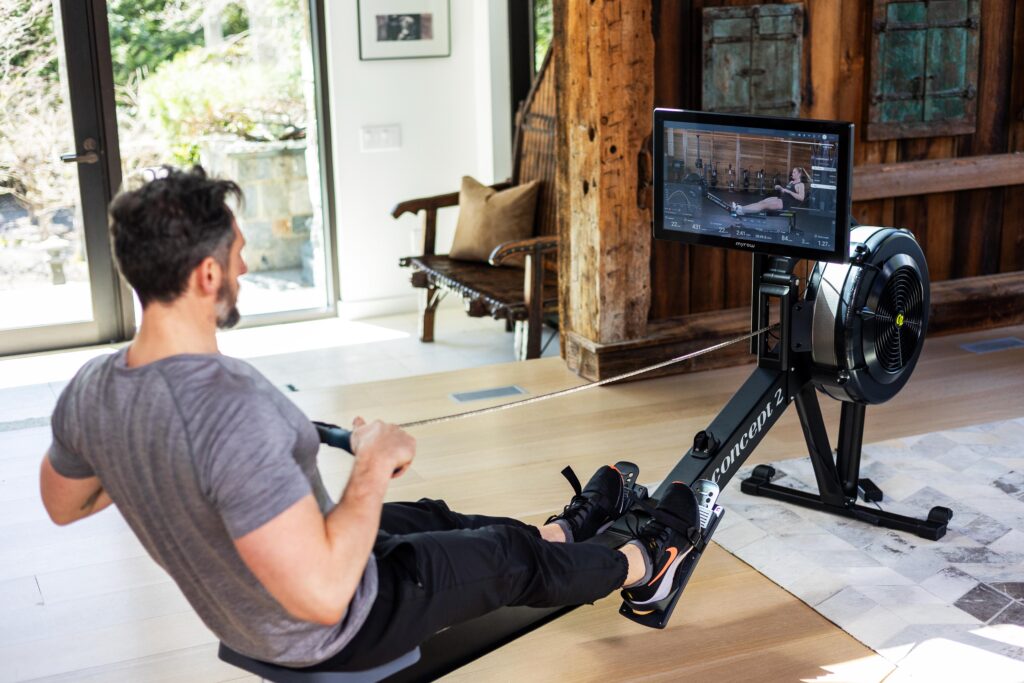 a man using a rowing machine