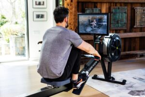 a man on a rowing machine