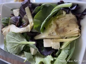 a salad in a white bowl