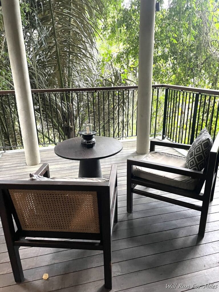 a chair and table on a deck