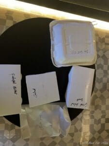 a group of food containers on a table