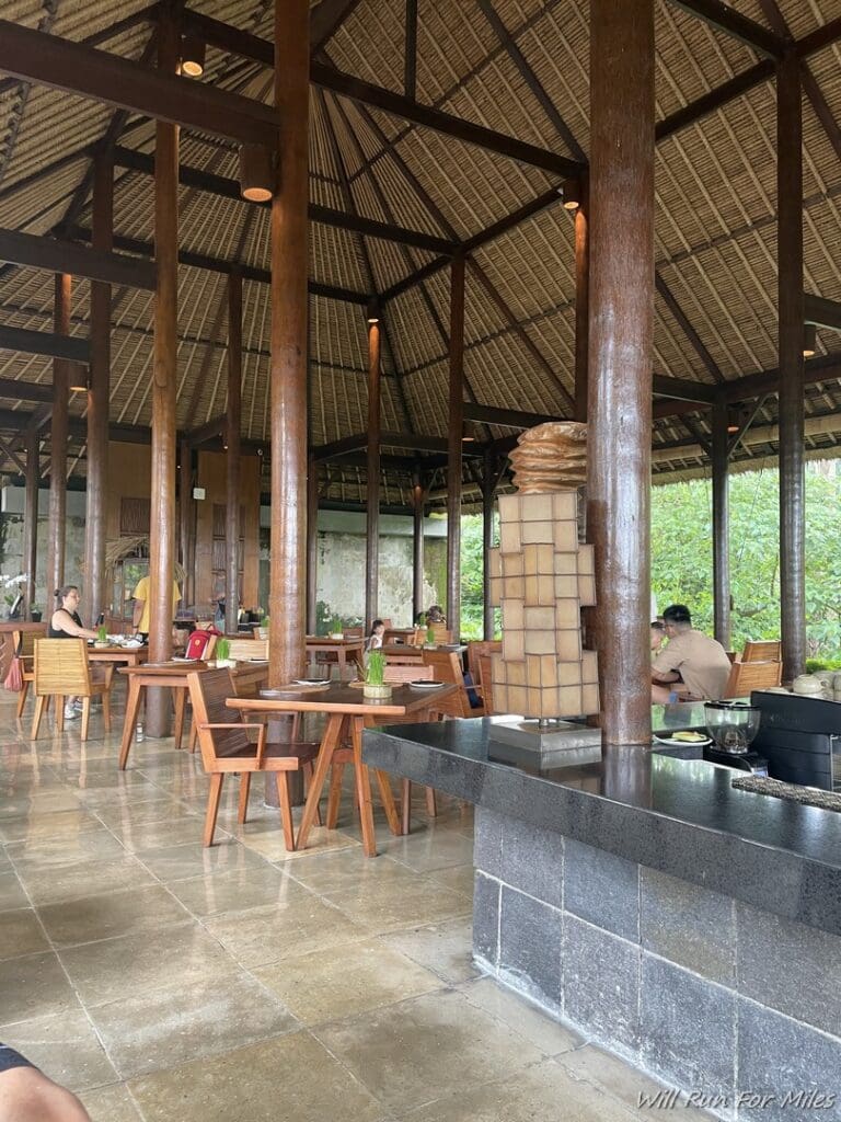 a restaurant with a large wooden structure