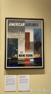 a framed poster on a wall