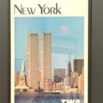 a poster of twin towers and a city