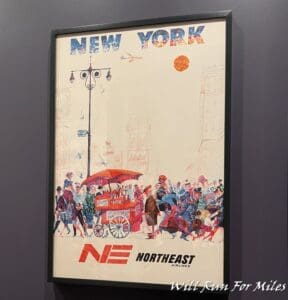 a framed picture of a city