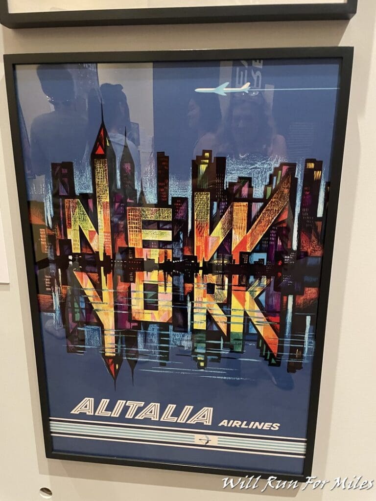 a framed picture of a city