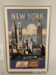 a framed poster of a city