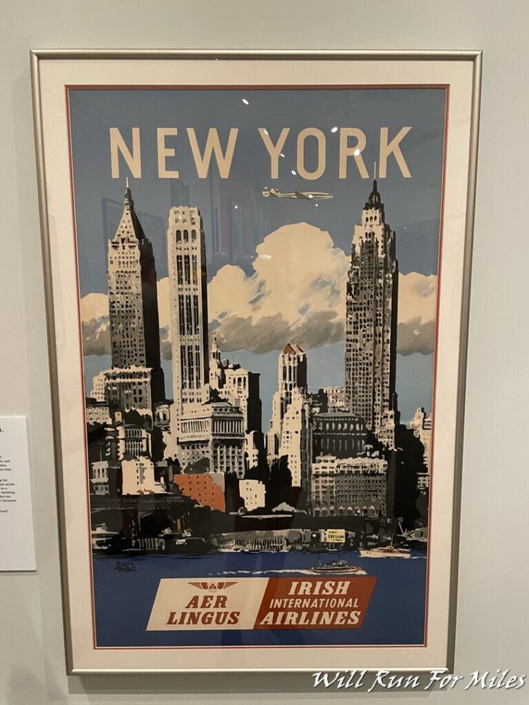 a framed poster of a city