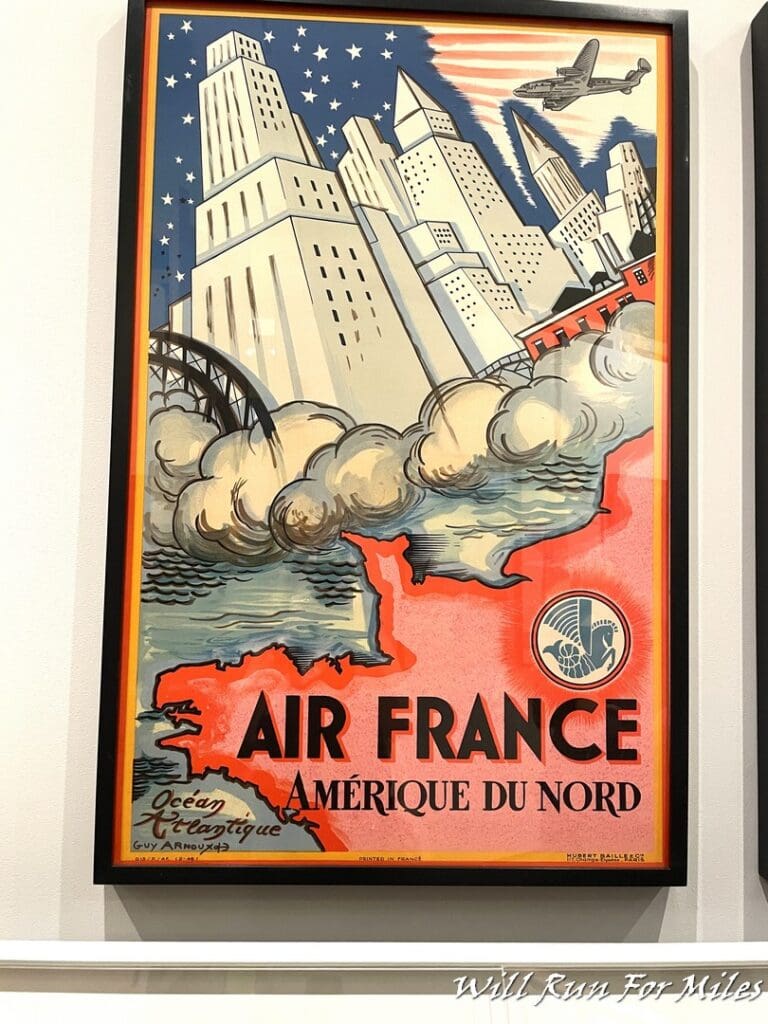 a framed poster on a wall