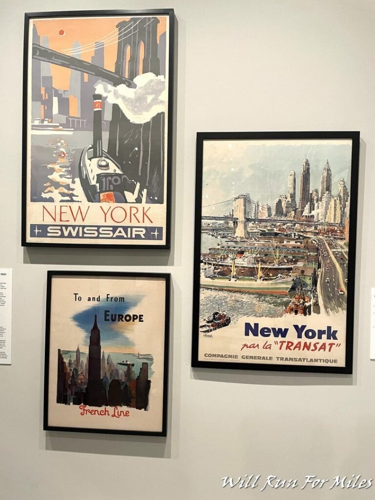 a group of posters on a wall