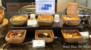 a group of bowls with different types of food